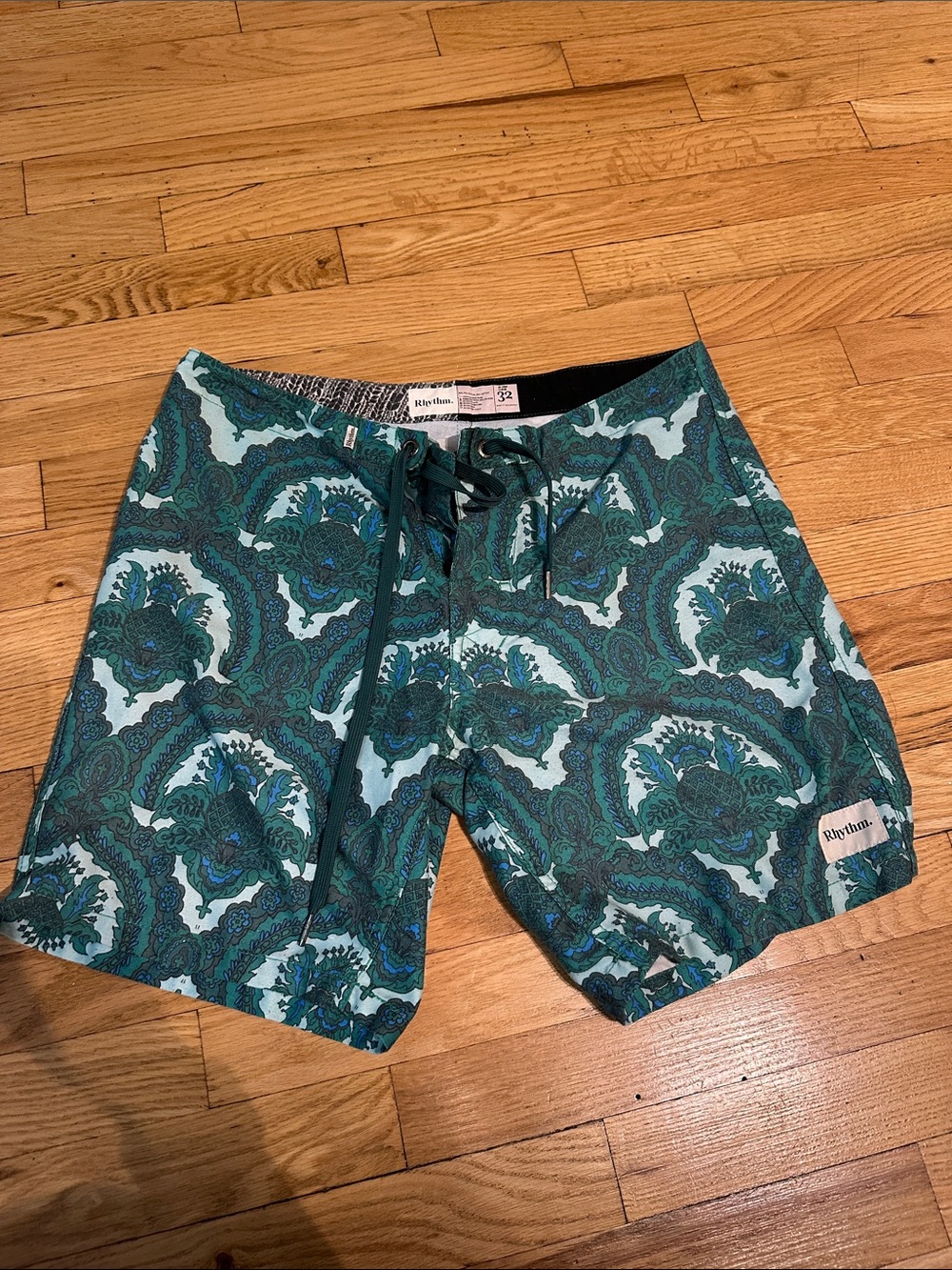 Rhythm. Teal and Dark Green Paisley Swim Shorts